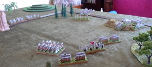 The Roman and Saxon cavalry charge towards each other.